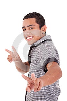 Young latin man with thumbs raised -victory