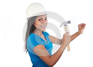 Young latino girl with hammer