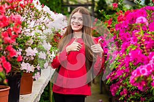 Young laughing women with thumbs up