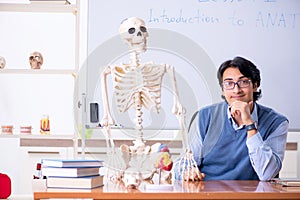 The young lecturer teacher teaching anatomy