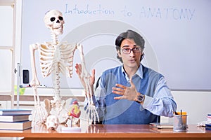 The young lecturer teacher teaching anatomy