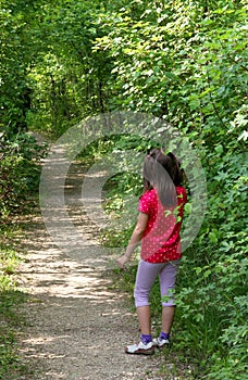 Young little GIRL lost in the Woods trail