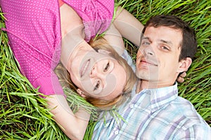 Young love couple on grass