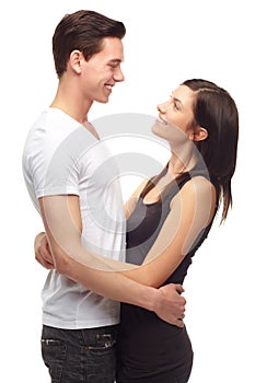 Young and in love. A cropped portrait of a happy and affectionate young couple, isolated on white.