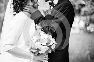 Young lovely and cheerfull wedding couple photo