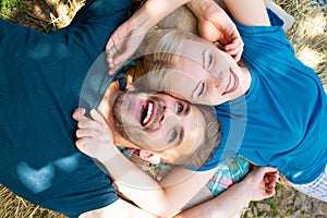 Young lovers hugging and embracing. Couple in love tenderness and affection. Top view.