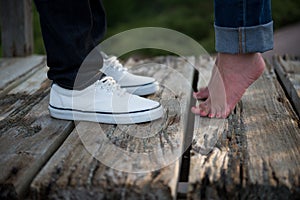 Young lovers on old dock