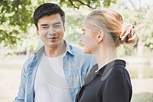 Young lovers say love in the park Romanticly. On a relaxing holiday