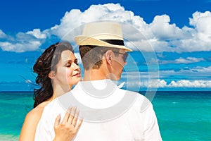 Young loving couple having fun in the tropical beach