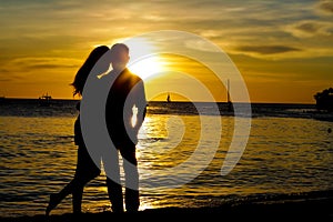 Young loving couple on wedding day on tropical beach and sunset