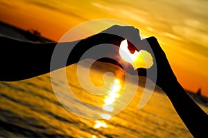 Young loving couple on wedding day on tropical beach and sunset