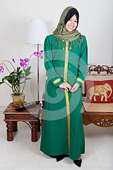 young Malay woman in green hijab