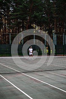 young male athlete playing tennis