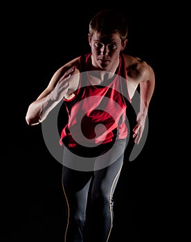 Young male athlete running