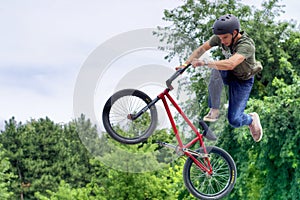 BMX freestyle teenage biker dangerous jump