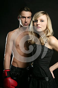young male boxer with blond beautiful girl