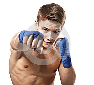 Young male boxer punched