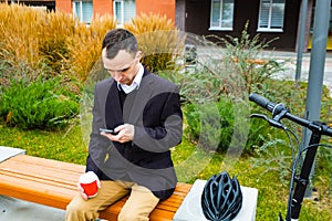 Young male businessman  outdoors