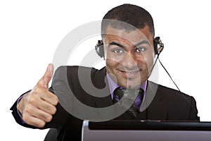 Young male call center agent express happiness