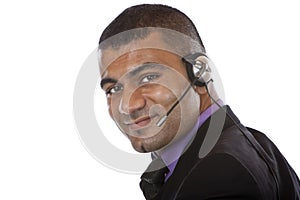 Young male call center agent with headset