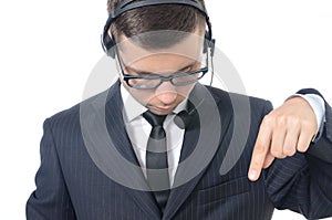 Young male call center operator in suit