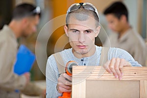 young male carpenter working