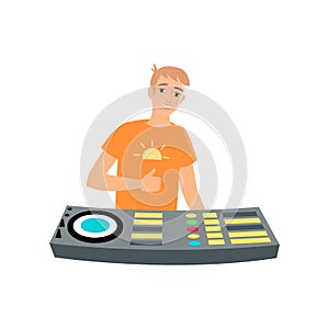 Young male DJ holds his hand thumbs up at turntable isolated on white background