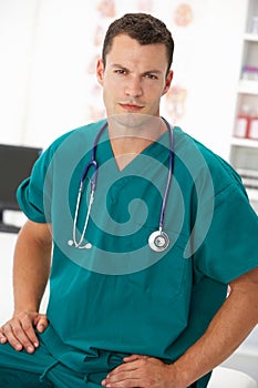 Young male doctor in consulting room