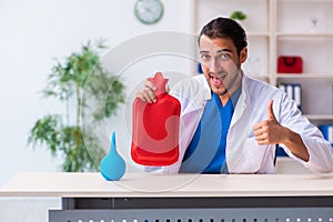 Young male doctor gastroenterologist working in the clinic