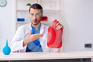 Young male doctor gastroenterologist working in the clinic