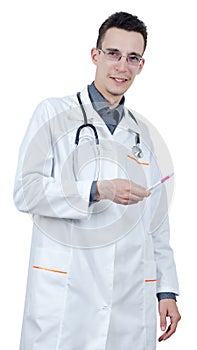 Young male doctor in glasses standing with a ballpoint pen in hand and looking at the camera.