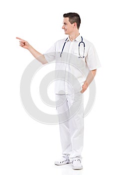 Young male doctor pointing