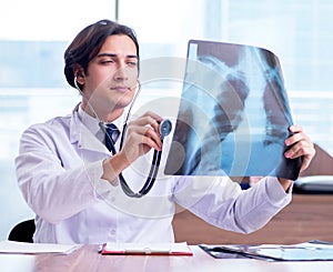 Young male doctor radiologist working in the clinic