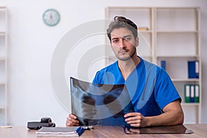 Young male doctor radiologist working in the clinic