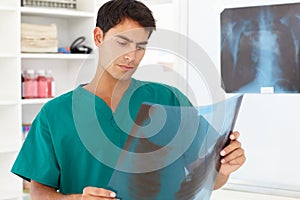 Young male doctor with x-ray