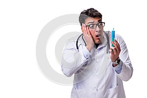 The young male doctor with a syringe isolated on white background