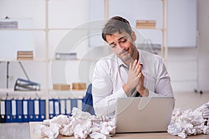 Young male employee in rejected ideas concept