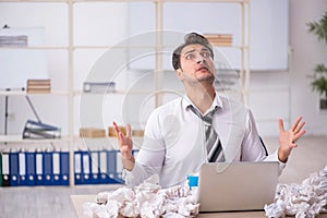 Young male employee in rejected ideas concept