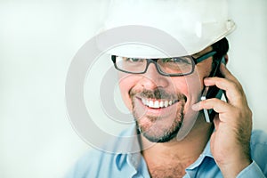 Young male engineer on the phone