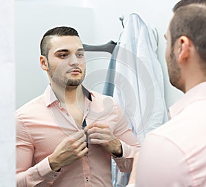 Young male at fitting-room