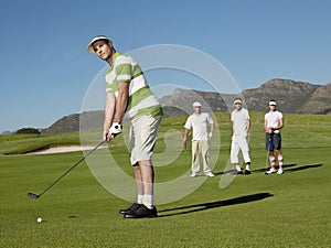 Young Male Golfer Playing Golf