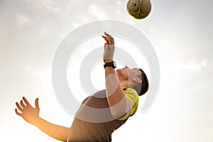 Young, male man playing soccer