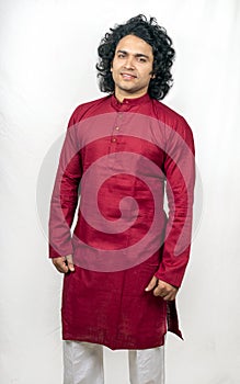 Young male model wearing red kurta