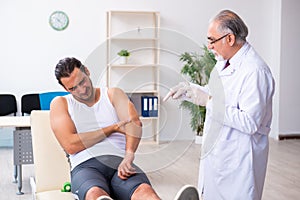 Young male patient visiting experienced doctor