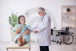 Young male patient visiting experienced doctor radiologist