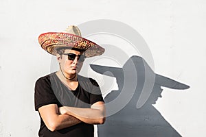 Young male person in sombrero. Mexico independence festive concept of man wearing national mexican hat