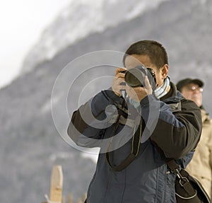 Young male photographer