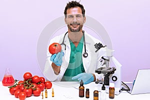 Young male scientist doing experimentation on vegetables in the laboratory