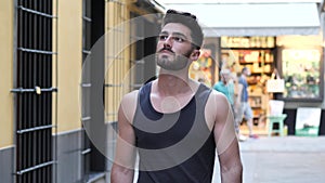 Young male tourist exploring old italian town