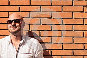 Young Man Against a Brick Wall